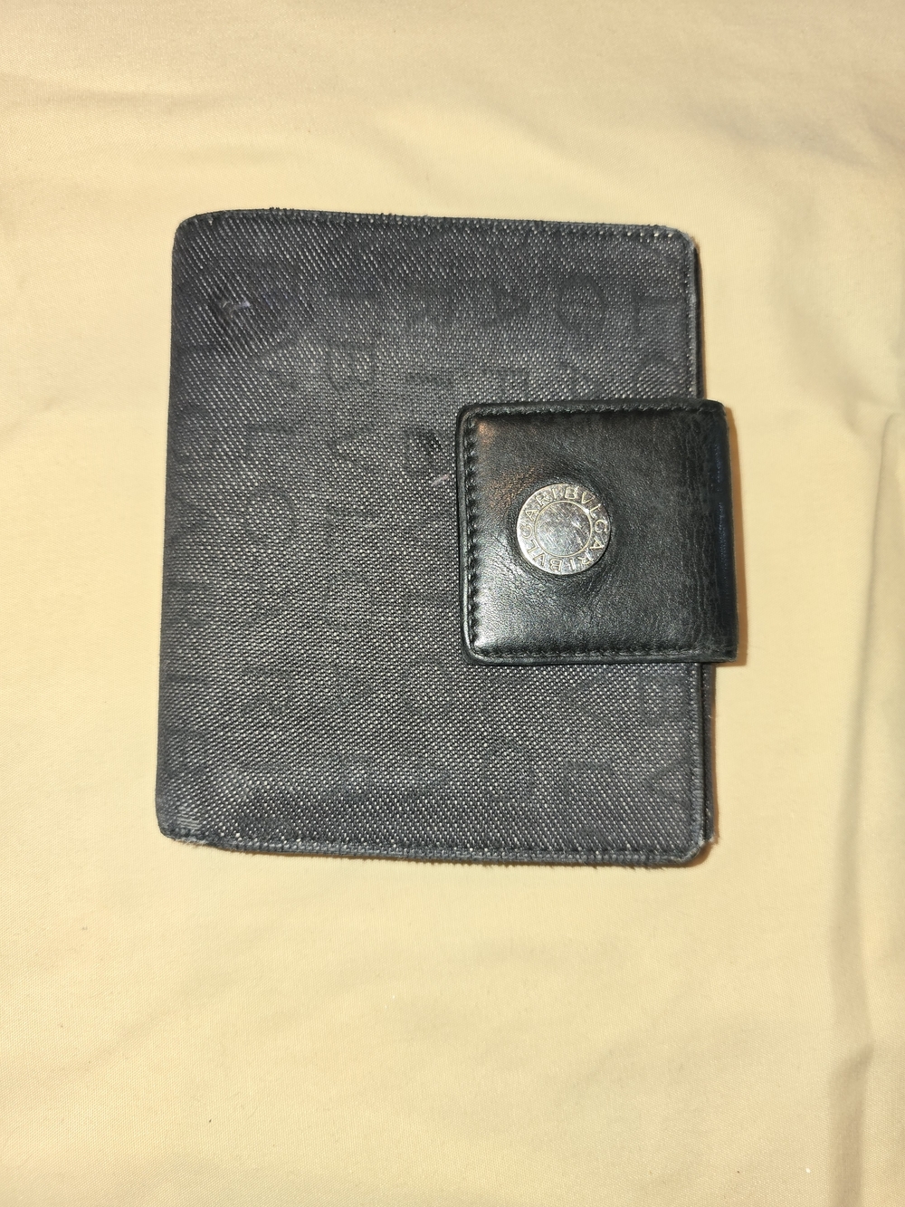 Bvlgari Logomania Men's Black Bi-Fold Wallet with Snap Closure